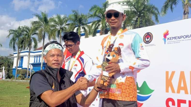 Yogi Saputra Atlet Panahan KORMI OKU Timur Sumbang Emas dan Perak di Fornas NTB