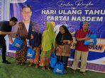 Sambut HUT ke-14, Partai NasDem OKU Timur Gelar Bakti Sosial
