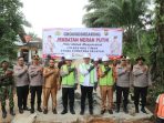 Kapolres OKU Timur Ground Breaking Jembatan Merah Putih dan Salurkan Bansos di BP Bangsa Raja